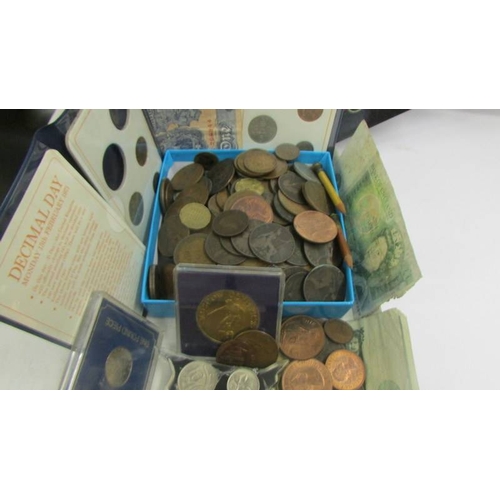 2190 - A good lot of old coinage, £1 notes etc.,