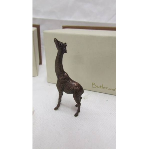 2412 - Two boxed Butler & Peach fine bronze animal being a giraffe and a barn owl,