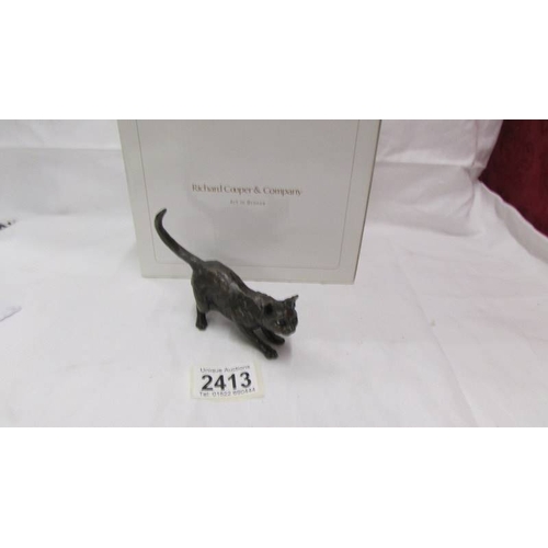 2413 - A boxed Richard Cooper & Company, art in bronze, limited edition crouching cat, 95/100.