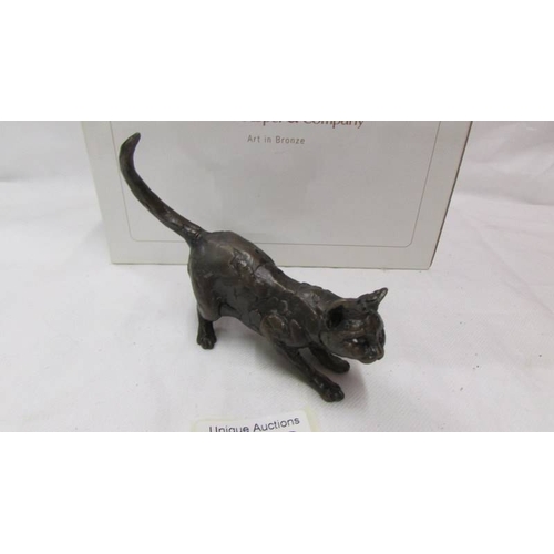 2413 - A boxed Richard Cooper & Company, art in bronze, limited edition crouching cat, 95/100.