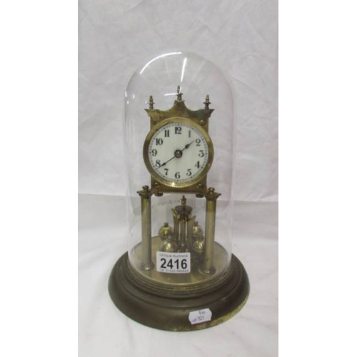 2416 - A 1905 Juhresuhren Fabrik anniversary clock under glass dome, need new feather and no key. (Collect ... 