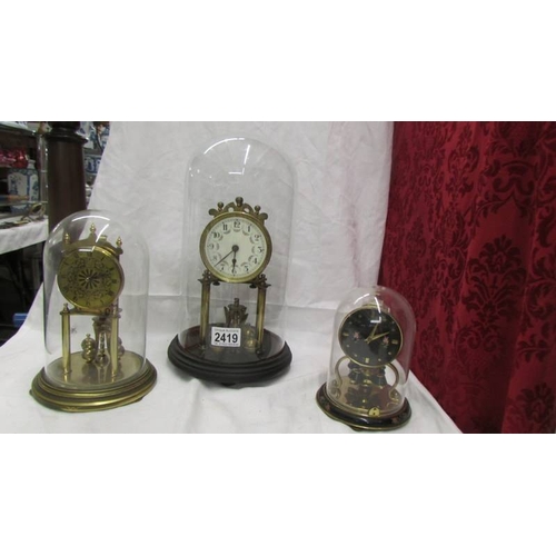 2419 - Three anniversary clocks for spares or repair, Large and medium have glass domes, smaller dome is pl... 