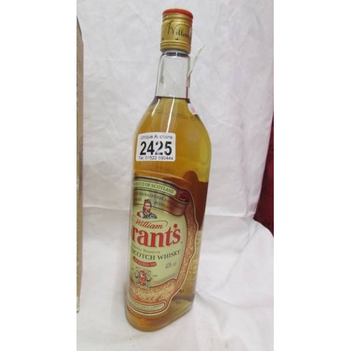 2425 - A boxed bottle of Knockando pure single malt scotch whisky and a bottle of Grant's finest Scotch whi... 