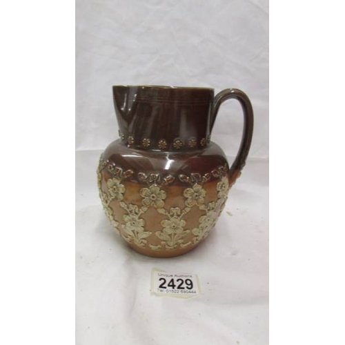 2429 - A Doulton Lambeth stone ware jug.