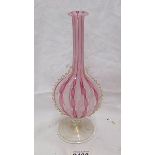 2430 - A Venetian Latticino vase with ribbon twist pattern in pink and white. In good condition.