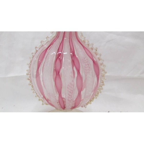 2430 - A Venetian Latticino vase with ribbon twist pattern in pink and white. In good condition.