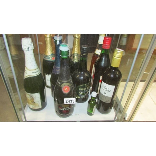 2433 - 5 bottles of sparkling wine, red wine etc.,