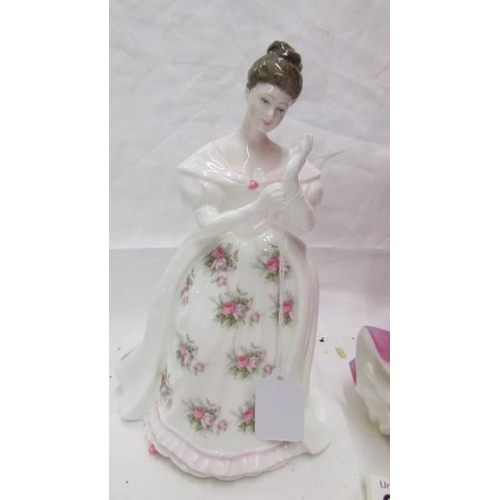 2435 - Two Royal Doulton figurines - Summer Rose Hn3309 and Melissa HN2467.