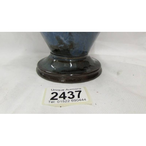 2437 - A Doulton Lambeth vase (repair to base).