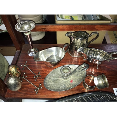 1314 - A large quantity of silver plate items including candlesticks, tray & silver napkin rings etc.