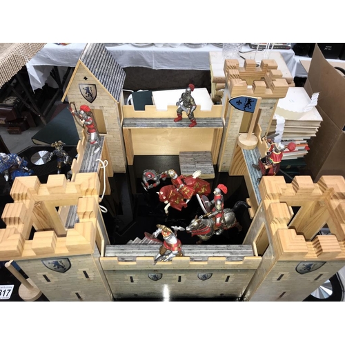 1317 - A toy Fort & quantity of toy knights & soldiers etc.