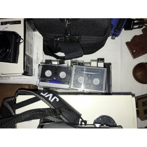 1331 - A good lot of cameras including boxed Fugi film X-S1, Panasonic Lumix, JVC video camera, tripods & h... 