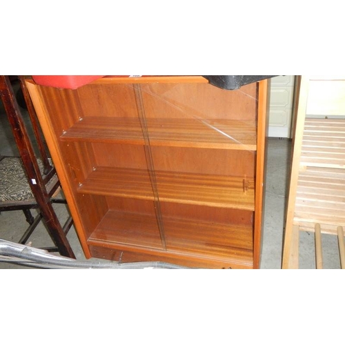 105 - A 1960's book case with sliding glass doors. (collect only)