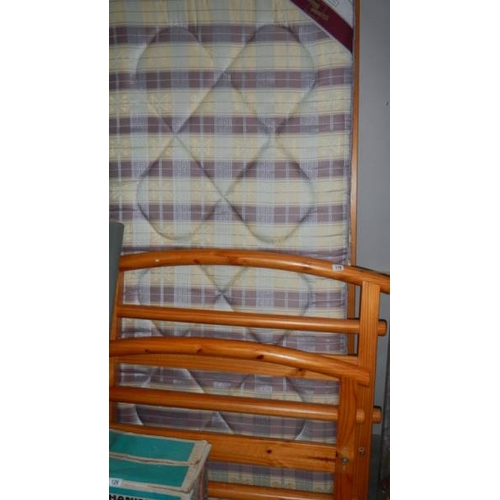 118 - A good clean pine framed single bed. (collect only)