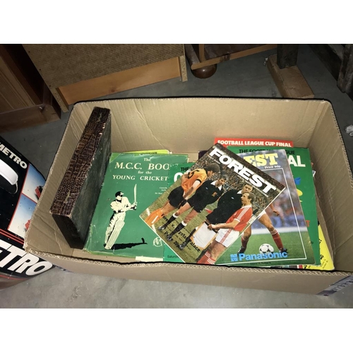 1424 - A box of children's books (A/F), Scalextric Mighty Metro & box of football programmes including Nott... 