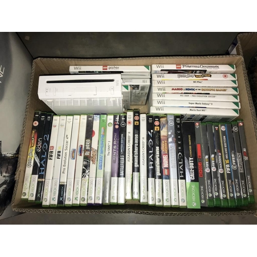 1425 - 4 boxes of Xbox & Nintendo Wii games, accessories, consoles & guitars