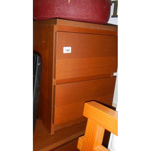 144 - A two drawer mahogany bedside. (collect only)