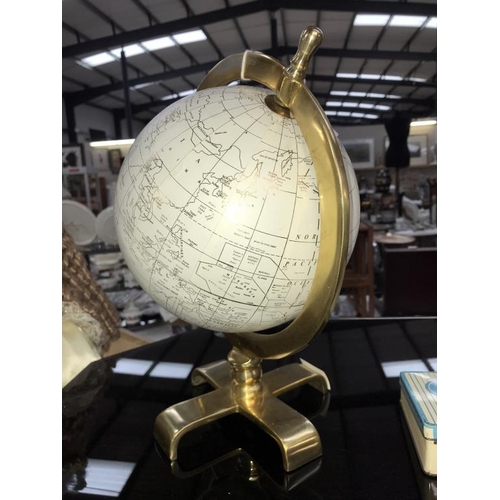 1448 - A globe on brass base