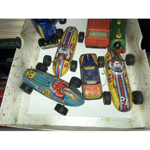 1451 - A quantity of 1950's tin plate racing cars including Tonka jeep etc.