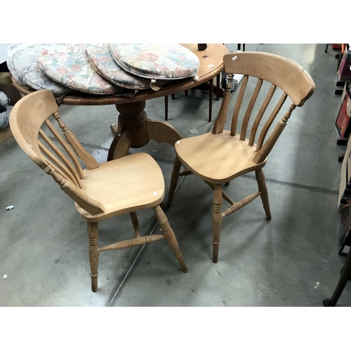 1518 - A round solid pine dining table (top not fixed) & 2 chairs with 7 cushions (table diameter 122cm x 7... 