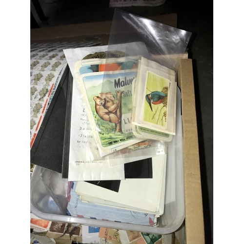 1526 - A box of kiloware stamps including unsorted & sheets