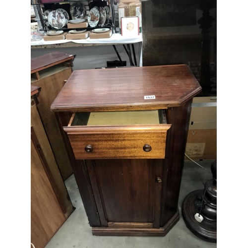 1537 - A dark wood stained cupboard with drawer & stool