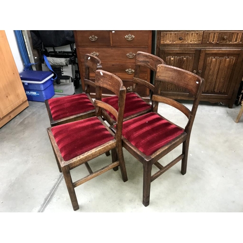 1552 - A set of 4 dark oak dining chairs