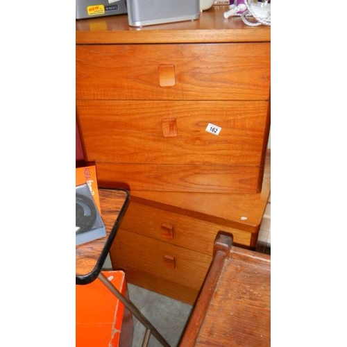 162 - A pair of teak bedside cabinets. (collect only)