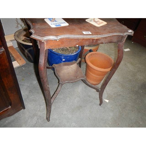 174 - An old mahogany side table. (collect only)