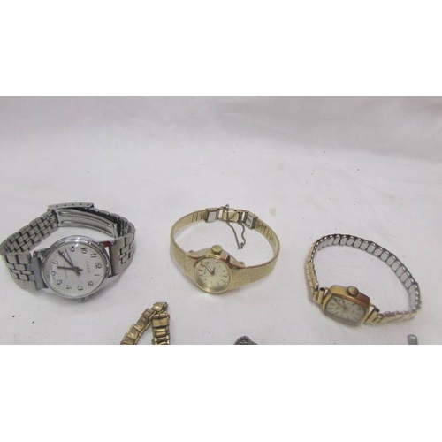 2119 - Six vintage ladies wrist watches and two watch heads.