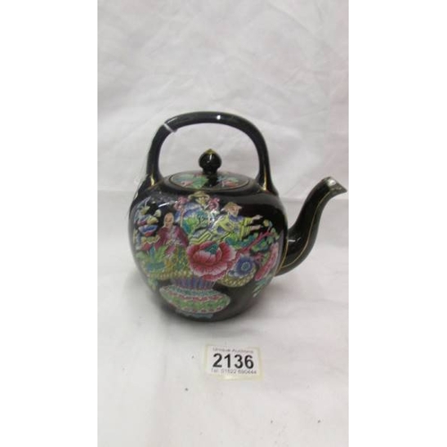 2136 - A Chinese hand painted tea pot.