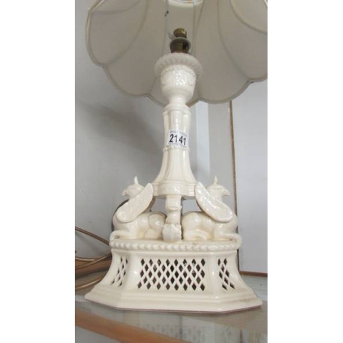 2141 - A Royal Creamware 'Gryphin' table lamp with shade.