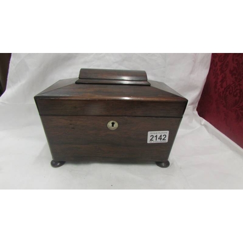 2142 - A Victorian mahogany tea caddy complete with glass mixing bowl.