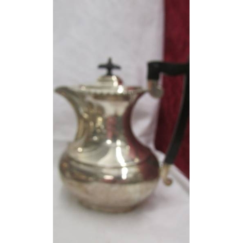 2144 - Two silver plate coffee pots and a silver plate teapot.