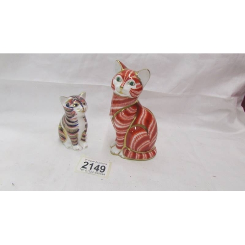 2149 - Two Royal Crown Derby cat paperweights both with gold stoppers.