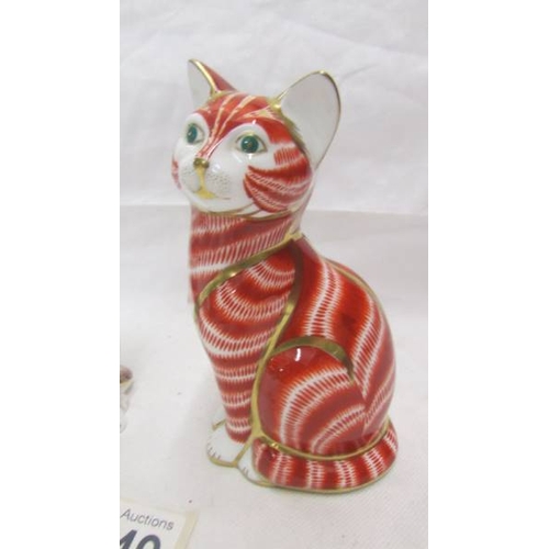 2149 - Two Royal Crown Derby cat paperweights both with gold stoppers.