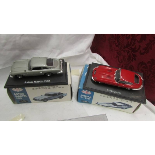 2186 - A quantity of die cast models including boxed Aston Martin DB5, Jaguar E Type etc.,