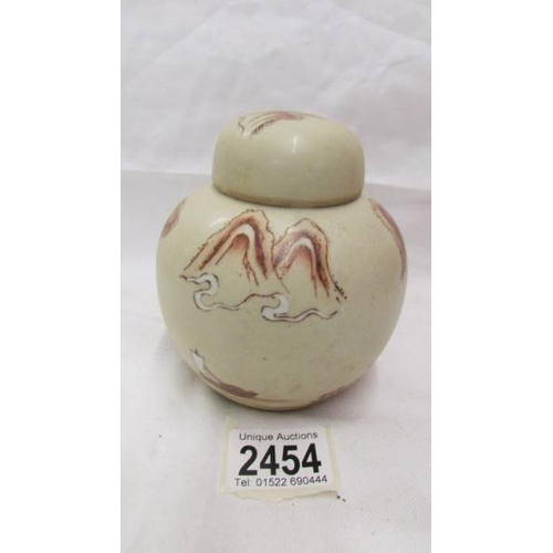 2454 - A small hand painted oriental ginger jar.