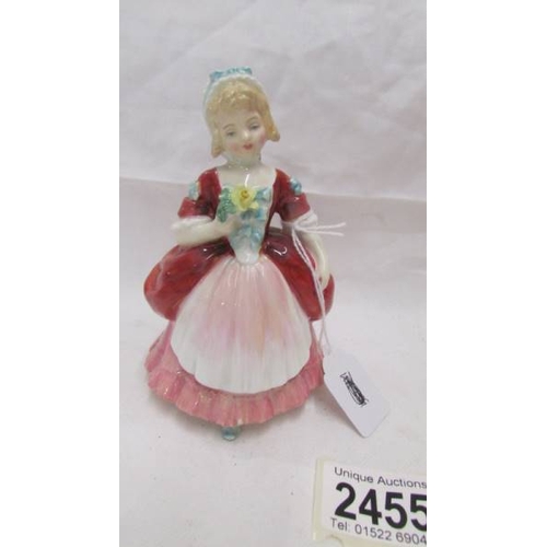 2455 - Two Royal Doulton figurines - Springtime HN 3033 and Valerie HN 2107.