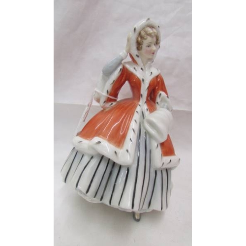 2456 - 3 Royal Doulton figurines - Winter's Day HN 4589, Autumn Breezes HN 1911 and Noelle HN 2179.