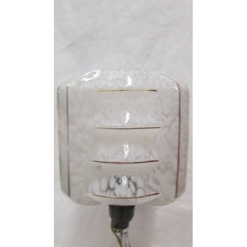 2457 - An art deco chrome figurine table lamp complete with shade.