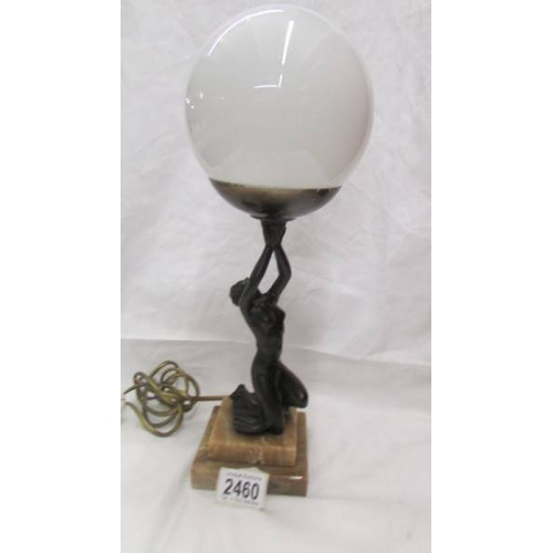 2460 - An art deco bronzed copper figurine table lamp.