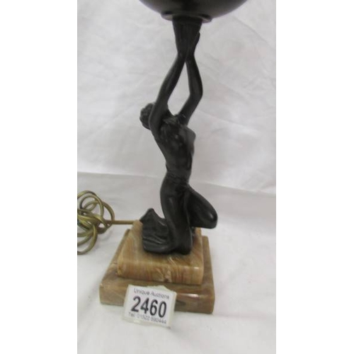 2460 - An art deco bronzed copper figurine table lamp.