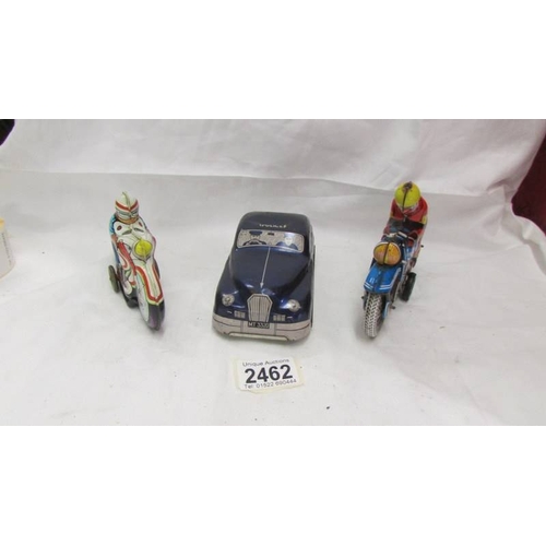 2462 - A tinplate Mettoy police car and Western Germany and Spanish motor cycles.