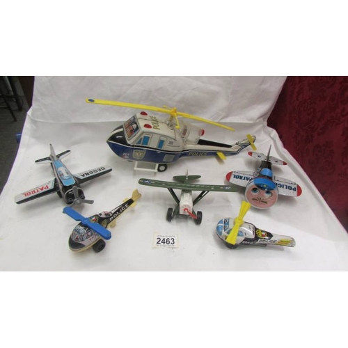 2463 - A selection of Japanese tin plate police airplanes and helicopters including large 'TN' Japan batter... 