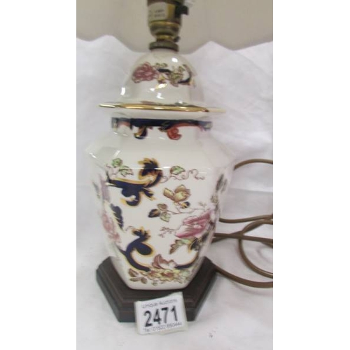 2471 - An oriental style table lamp with shade.