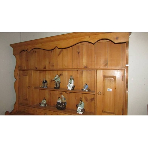 2485 - A good 3 door pine dresser. (collect only)