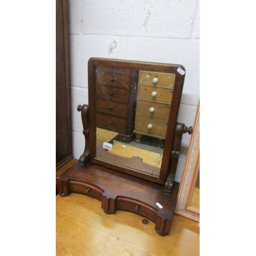 2504 - A mahogany toilet mirror. (collect only)