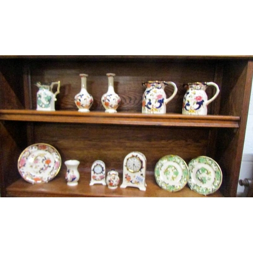 2506 - Three Mason's ironstone jugs, pair of vases, 2 clocks, 3 plates and 2 other items.