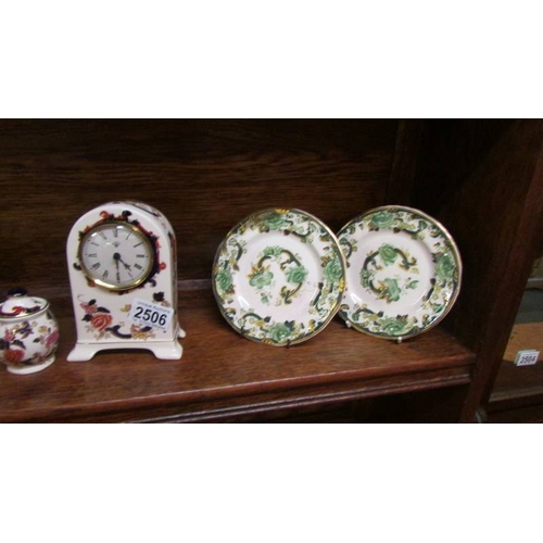 2506 - Three Mason's ironstone jugs, pair of vases, 2 clocks, 3 plates and 2 other items.